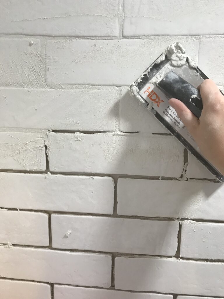 white faux brick tile backsplash - Clover Lane