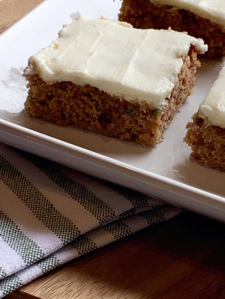 The most moist Zucchini Cake packed with Fall flavor!