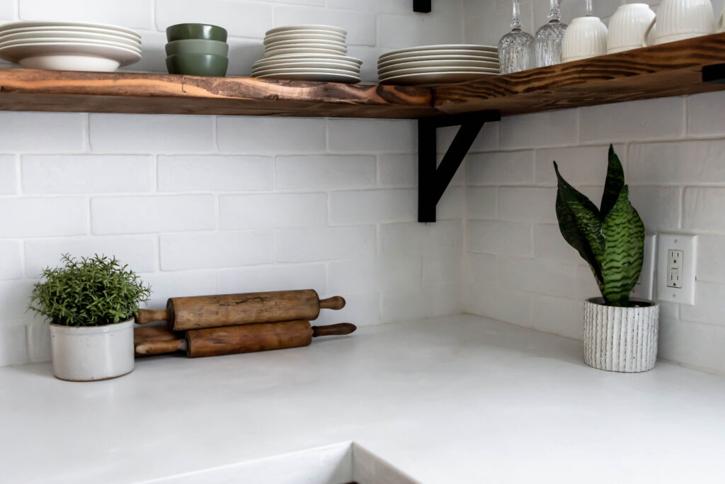 Charming White Concrete Countertops. Be sure to seal to maintain their beauty! #DIY #concrete