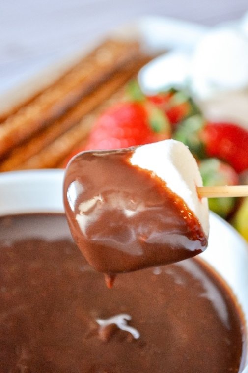 Decadent Chocolate Fondue to make any occasion more special! #fruit #chocolate #cookies